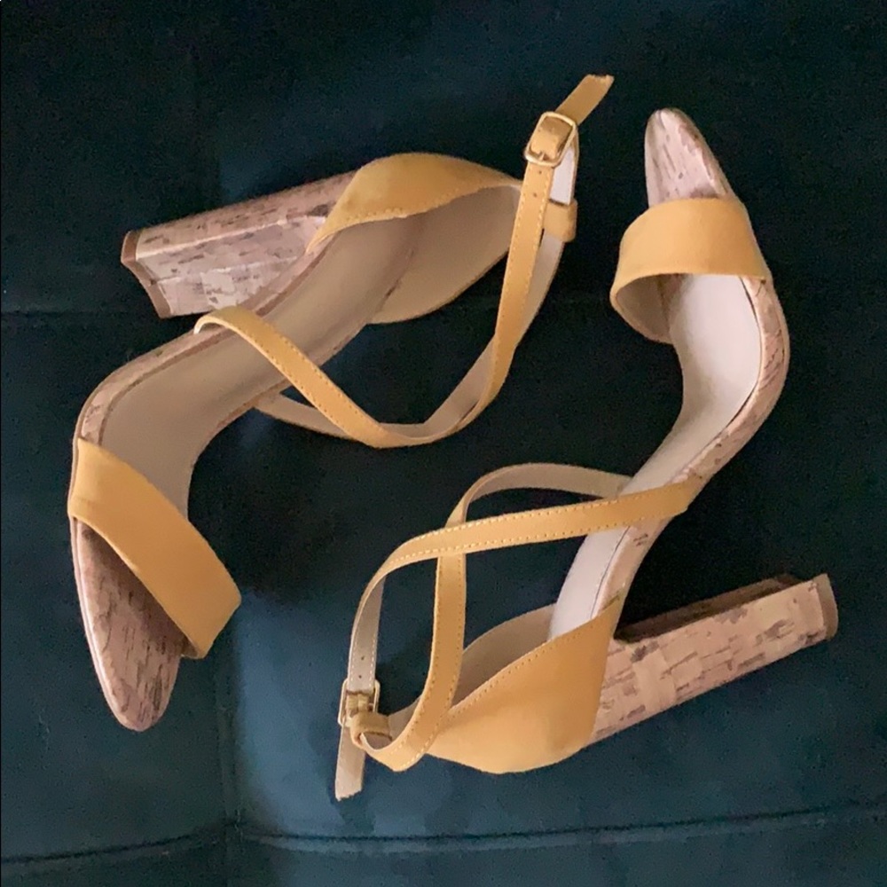 Mustard color suede block hill sandals.